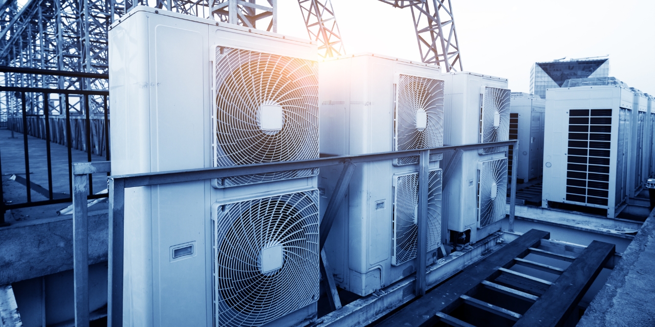 Commercial HVAC units on top of a building.