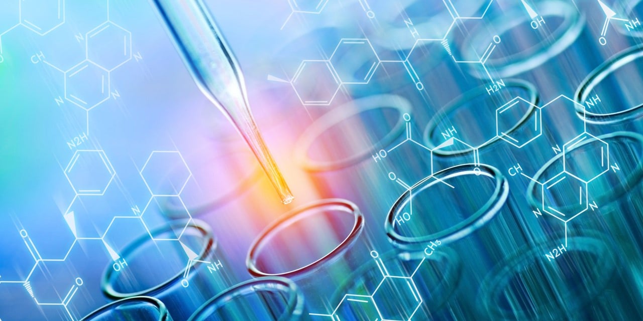 Dropper adding sample to a test tube