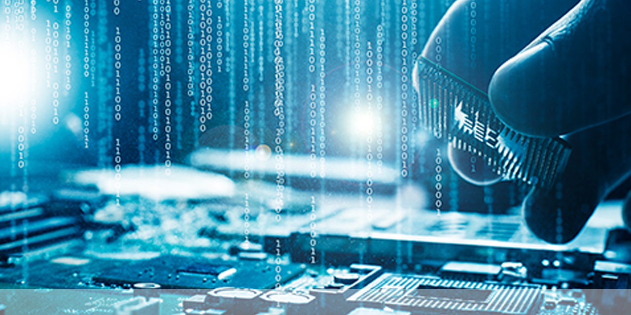 Hand placing a computer chip into a server