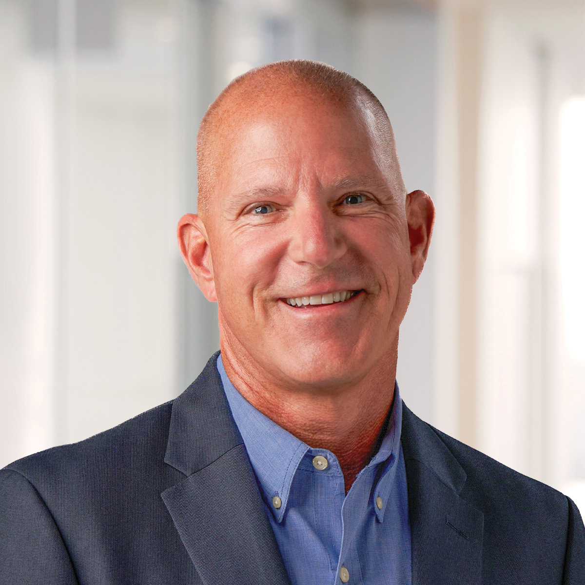 Professional headshot of Greg Jessup