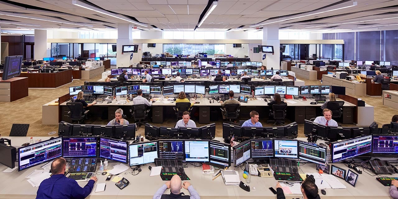 Silver Laketrading floor wide angle shot of traders at desks looking at computers.